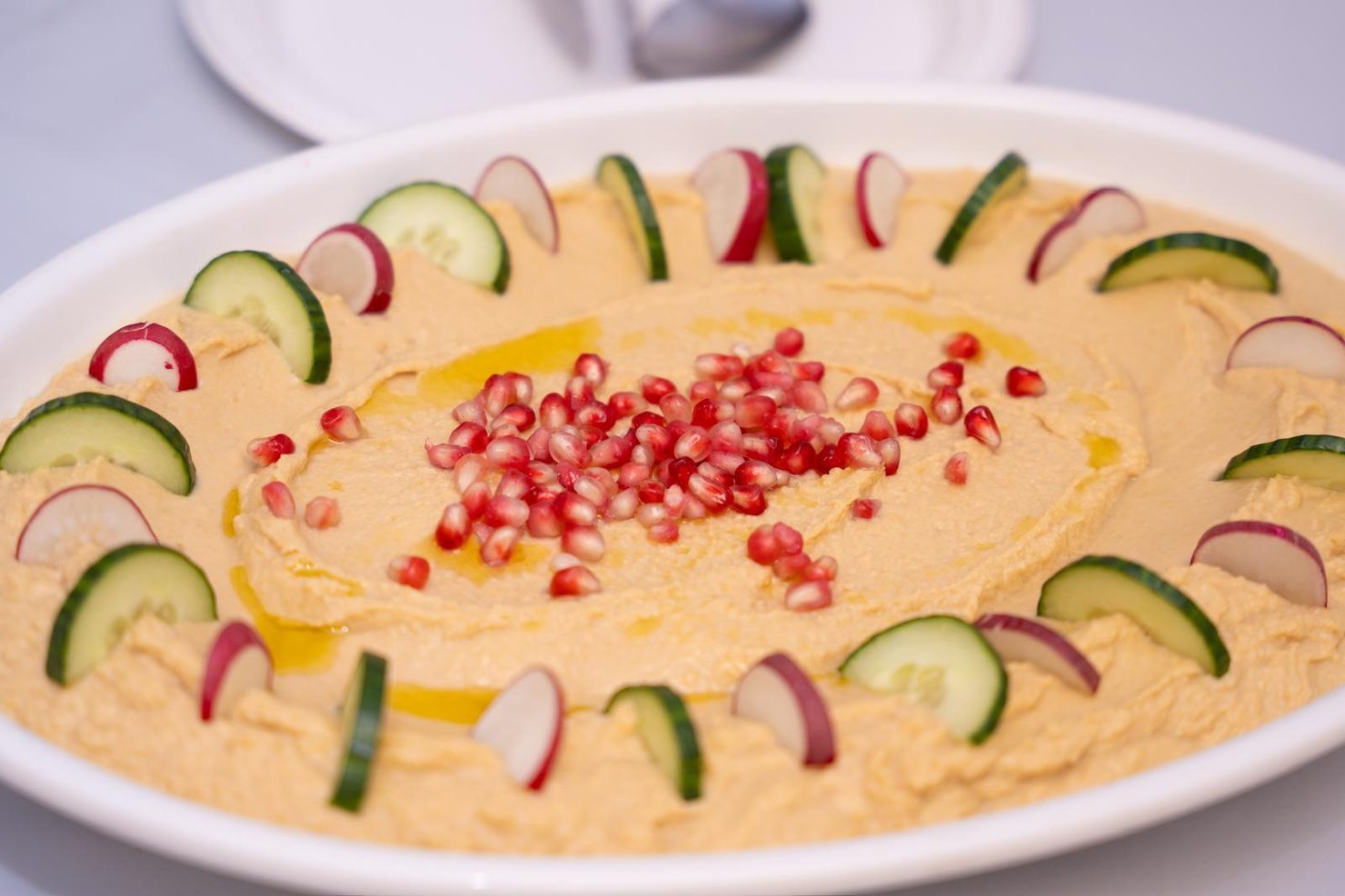 Fresh hummus appetizer plate for catering